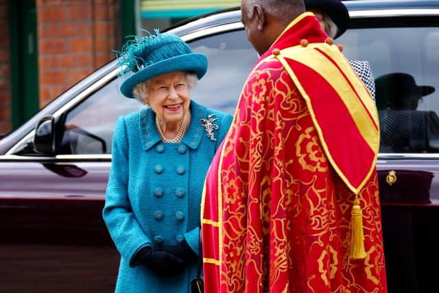 Queen Elizabeth II is greeted by Dean of Manchester Cathedral, Rogers Govender in July 2021 Credit: Getty