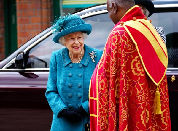Queen Elizabeth II is greeted by Dean of Manchester Cathedral, Rogers Govender in July 2021 Credit: Getty