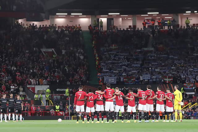 The game was preceded by a minute’s silence at Old Trafford. Credit: Getty.