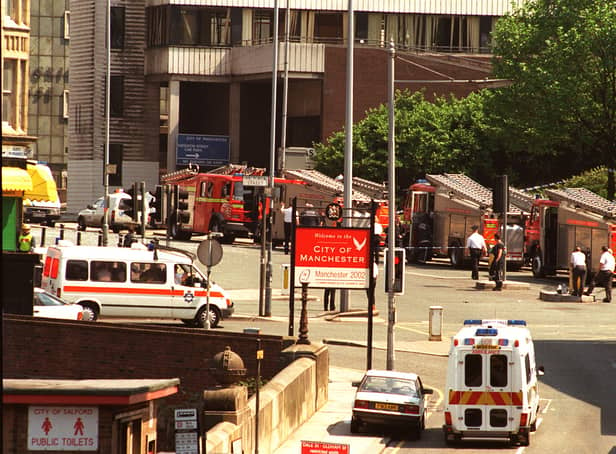 <p>Emergency vehicles in Manchester’s City centre after the IRA bomb explosion in 1996</p>