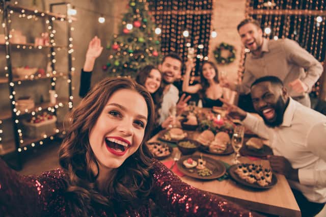 Enojy Christmas dinner with friends Credit: deagreez - stock.adobe.com