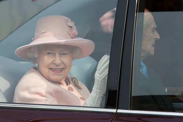 Queen Elizabeth II arrives at Manchester Town Hall on March 23, 2012 in Greater Manchester.  Credit: Heathcliff O'Malley - WPA Pool/Getty Images