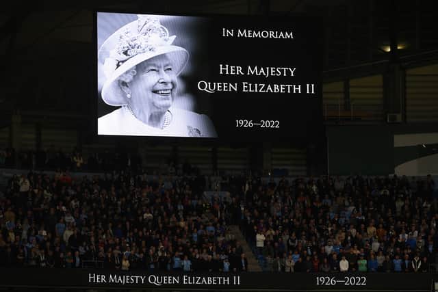 The Queen’s face was shown on the big screen at the Etihad. Credit: Getty.