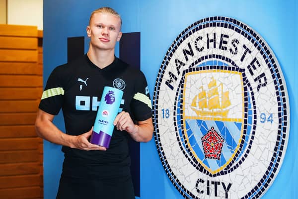Erling Haaland with the August 2022 Premier League Player of the Month award. Credit: Manchester City.