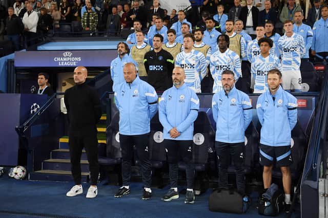 City’s players and staff observed a minute’s silence on Wednesday ahead of the Champions league game with Dortmund. Credit: Getty.