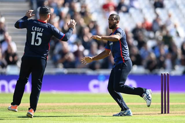 Liam Hurt of Lancashire celebrates with Steven Croft after dismissing Ollie Robinson of Kent during the Royal London Cup Final between  Kent Spitfires and Lancashire at Trent Bridge on September 17, 2022 in Nottingham, England. (Photo by Gareth Copley/Getty Images)