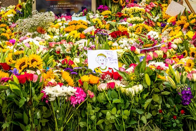 Floral tributes and messages have been left in St Ann’s Square Manchester since the announcement of Her Majesty Queen Elizabeth II’s death. Credit: Manchester City Council
