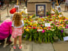What will happen next to the Queen’s flowers and tributes in St Ann’s Square and Manchester Central Library?