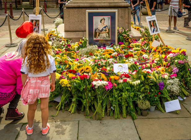 <p>People began leaving flowers and messages in St Ann’s Square Manchester soon after the announcement of Her Majesty Queen Elizabeth II’s death. Credit: Manchester City Council</p>