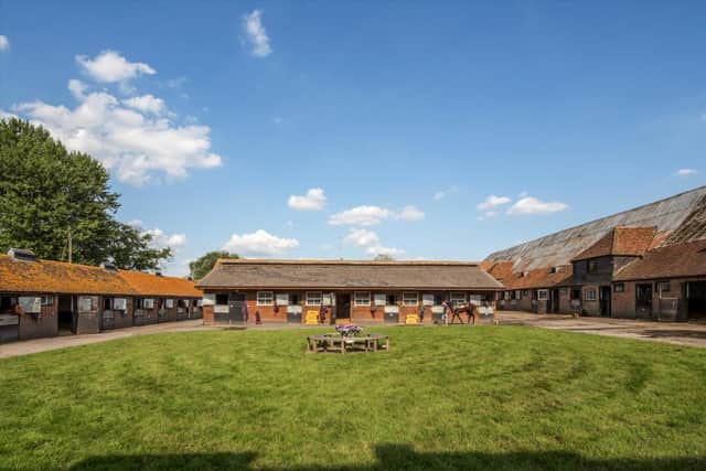 The equestrian facilities contain 105 loose boxes, 35 stalls, covered trotting ring, lunging ring, and covered horse walker.