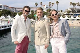 Take That attend the photocall of “Greatest Days” the movie during the 75th annual Cannes film festival  Credit: Getty