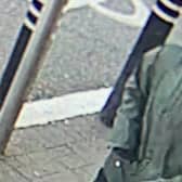 Police are searching for this man after nearly £30k was taken in a cash-in-transit robbery at Asda Hulme Credit: GMP