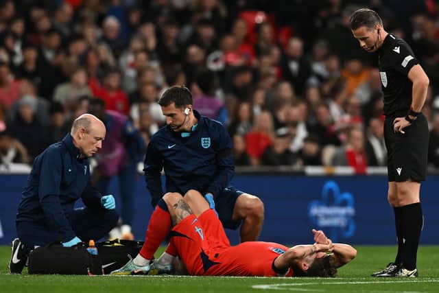 John Stones appeared in real pain just before he was replaced. Credit: Getty.