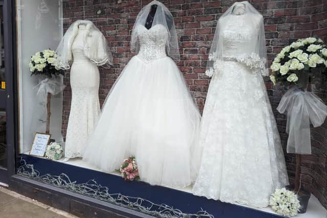 Wedding dresses worn by Jane Danson (left) and Kym Marsh (right) from Coronation Street on sale at St Ann’s Hospice shop in Stockport