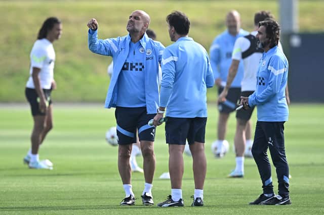 Guardiola has had limited time on the training ground in the build-up to the derby. Credit: Getty.