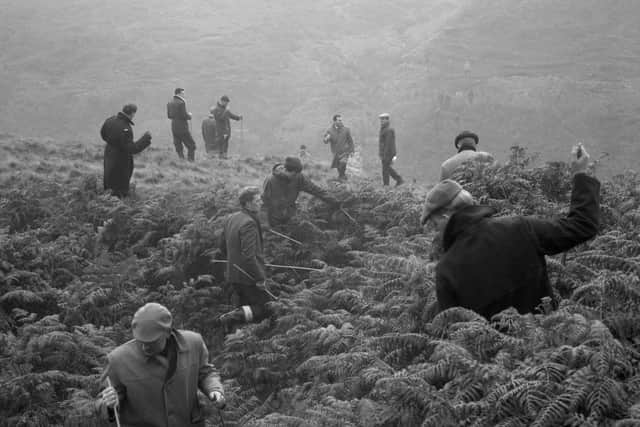 Archive photo of police searching on Saddleworth Moor Credit PA