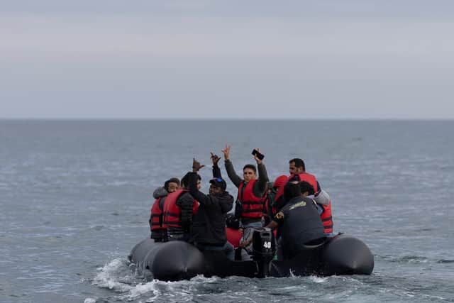 An inflatable craft carrying migrants crossing the English Channel. Photo: Dan Kitwood/Getty Images