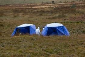 Police are continuing to investigate a site on Saddleworth Moor