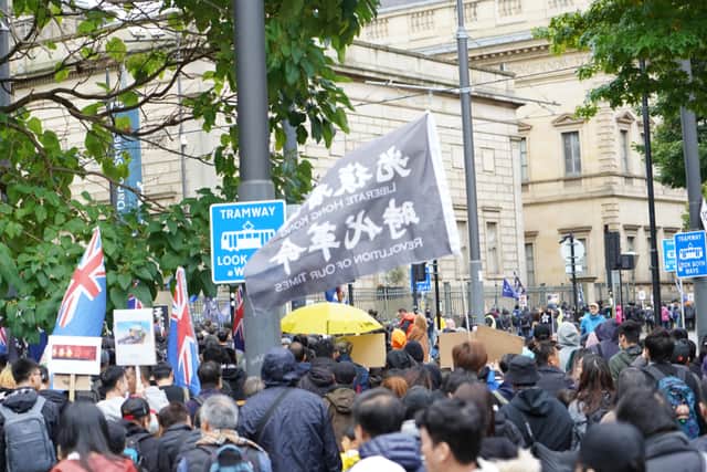 People attending the Hong Kong demonstration in Manchester city centre