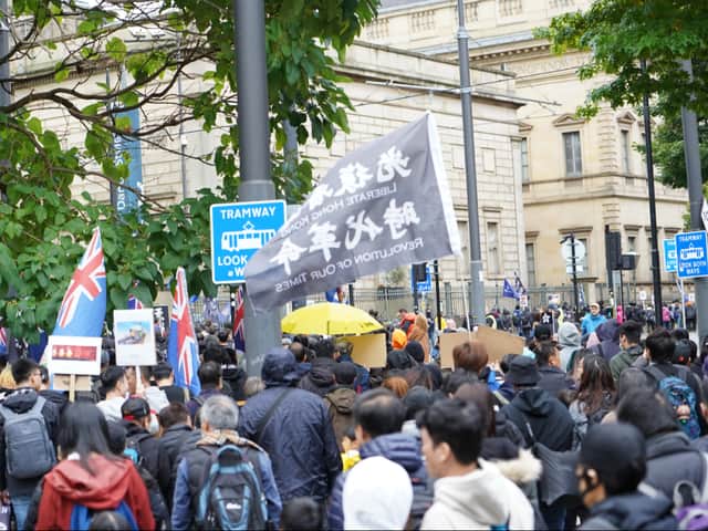 People attending the Hong Kong demonstration in Manchester city centre