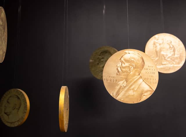 Replicas of the official Nobel Peace Prize gold medal.
