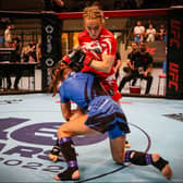Kelly Staddon (in red) fighting Martina Corradi of Italy at the 2022 IMMAF European Championships. Photo: IMMAF
