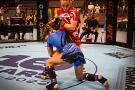 Kelly Staddon (in red) fighting Martina Corradi of Italy at the 2022 IMMAF European Championships. Photo: IMMAF