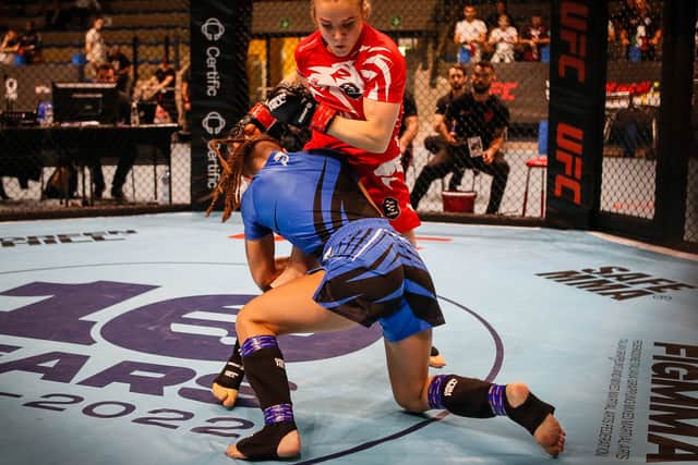 Kelly Staddon (in red) fighting Martina Corradi of Italy at the 2022 IMMAF European Championships. Photo: IMMAF