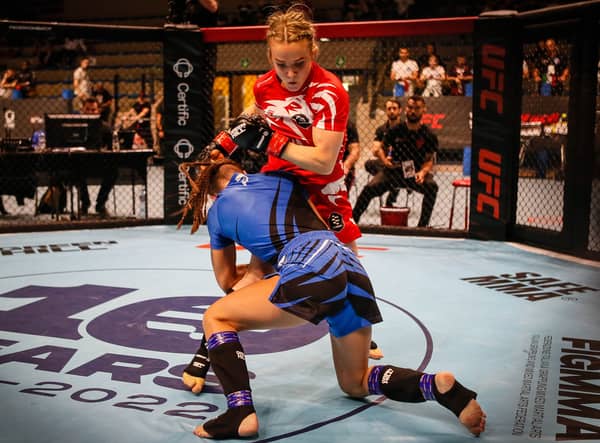 Kelly Staddon (in red) fighting Martina Corradi of Italy at the 2022 IMMAF European Championships. Photo: IMMAF