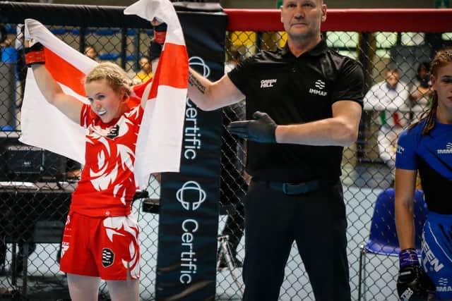 The referee indicates Kelly has won her quarter-final bout against Martina Corradi of Italy. Photo: IMMAF