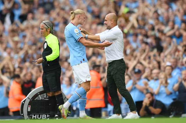 <p>Pep Guardiola feels Erling Haaland can still improve despite goalscoring start at Manchester City. Credit: Getty.</p>