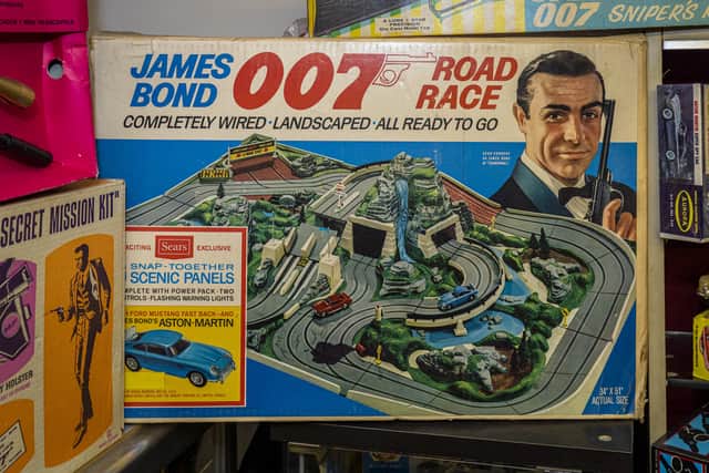 The biggest collection of James Bond memorbilia is owned by Nick Bennett in Leigh Credit: SWNS