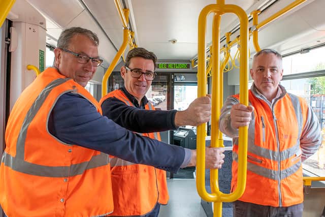 Graham Thornton, head of rolling stock projects at Keolis Amey Metrolink, Greater Manchester Mayor Andy Burnham and Danny Vaughan, TfGM’s head of Metrolink