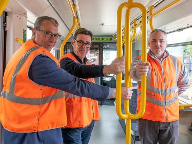 Graham Thornton, head of rolling stock projects at Keolis Amey Metrolink, Greater Manchester Mayor Andy Burnham and Danny Vaughan, TfGM’s head of Metrolink