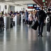 Passengers at the Departure gates at Manchester Airport Terminal 2 