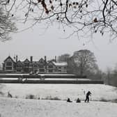 Snow covers the ground around Bramall Hall in Stockport Credit Getty