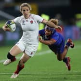 Abby Dow of England is tackled during the Pool C Rugby World Cup 2021 match between France and England 