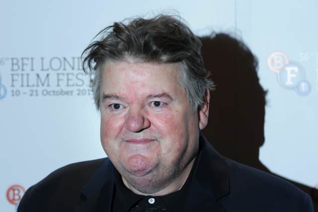British actor Robbie Coltrane attends a photocall for the film Great Expectations in central London on October 21, 2012.