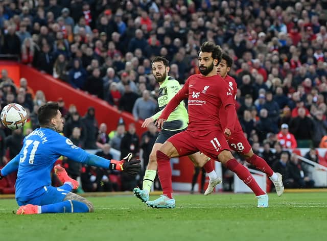 Mohamed Salah scores the only goal of Liverpool’s 1-0 win over Manchester City (Photo by Laurence Griffiths/Getty Images)