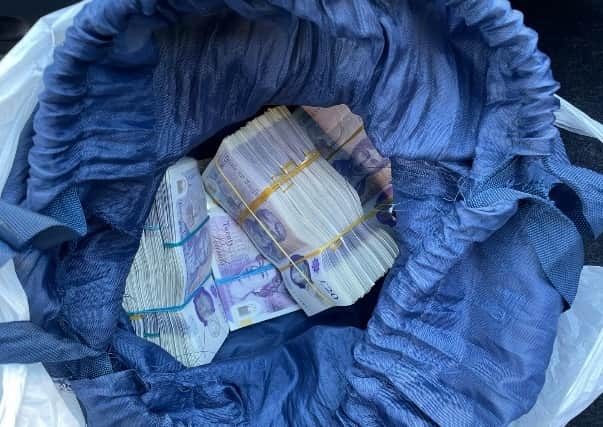 Thousands of pounds in cash was recovered from a vehicle stopped in Cheetham Hill