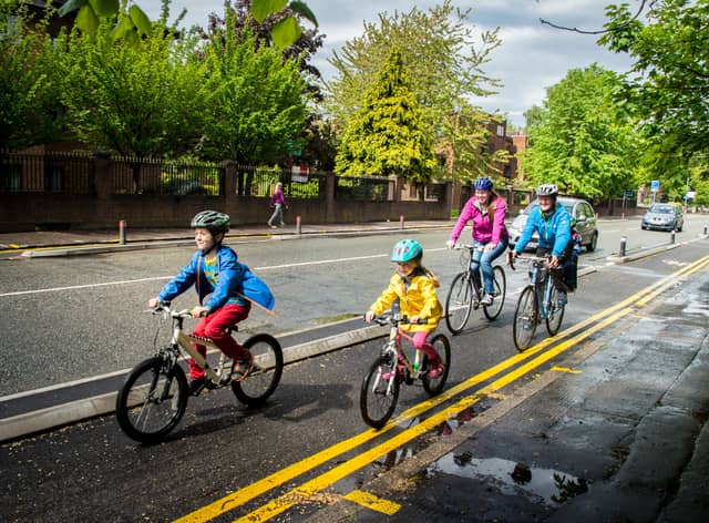A family out cycling in Greater Manchester. Photo: TfGM