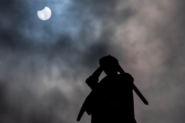 A partial solar eclipse can be seen in the Manchester sky on Tuesday.