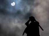 A partial solar eclipse can be seen in the Manchester sky on Tuesday.