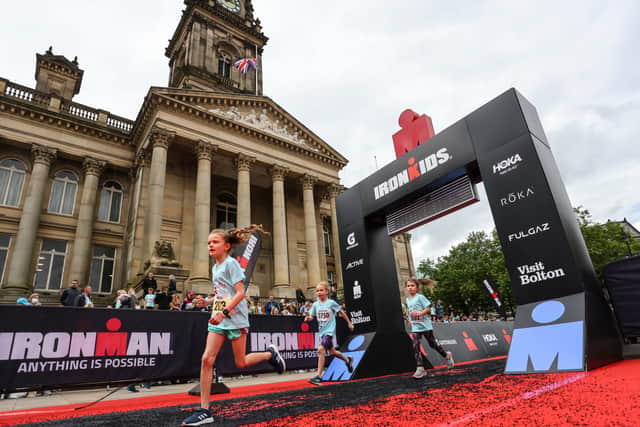 The Ironkids events finish beneath the iconic Ironman UK arch in front of Bolton town hall