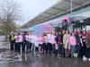 The bright pink BooBee bus raising awareness of breast cancer in Manchester