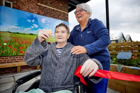 Victor Lund with Allison Keegan at the opening of the new garden