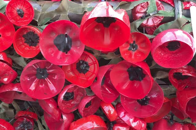 Each poppy is made from recycled plastic bottles painted with acrylic paint. 