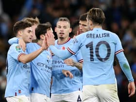 Manchester City players celebrate.  