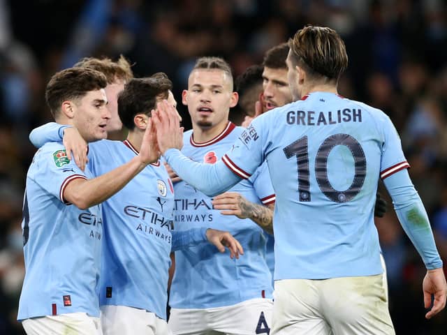 Manchester City players celebrate.  
