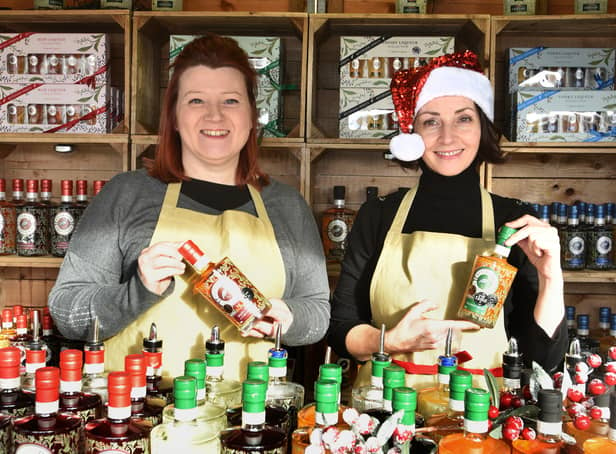 <p>Laura and Eileen sell gin on the Riverside Craft Spirits stall </p>